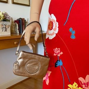 Coach Small Wristlet, in Metallic Gold- Used, in excellent condition